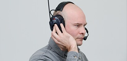 Umgebungsgeräusche hören
