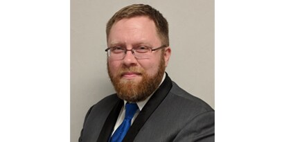 Portraitfoto von Ed Nelson.

